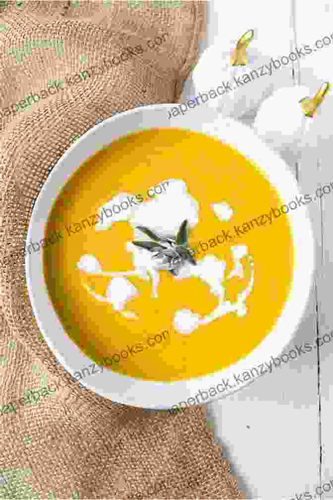 A Bowl Of Roasted Butternut Squash Soup Topped With Pumpkin Seeds And Fresh Herbs. Vegan Christmas Cookbook: 300+ Delicious Affordable And Easy To Make Vegan Recipes To Enjoy The Christmas Season With Your Loved Ones (Plant Based)