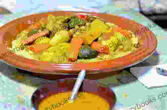 A Steaming Bowl Of Couscous With Vegetables, Featuring Fluffy Semolina, Sautéed Vegetables, And A Rich Vegetable Broth. Vegetarian Dishes From The Middle East