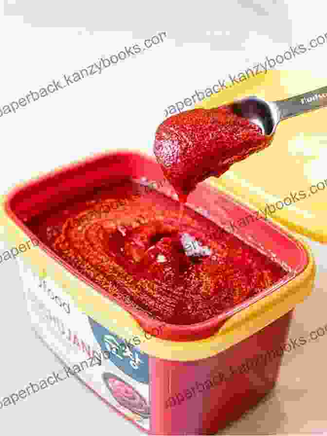 An Image Of Gochujang, A Fermented Red Pepper Paste, Showcasing Its Deep Red Color And Thick Texture. Cooking Korean Dishes At Home: Simple But Flavorful Korean Recipes You D Love