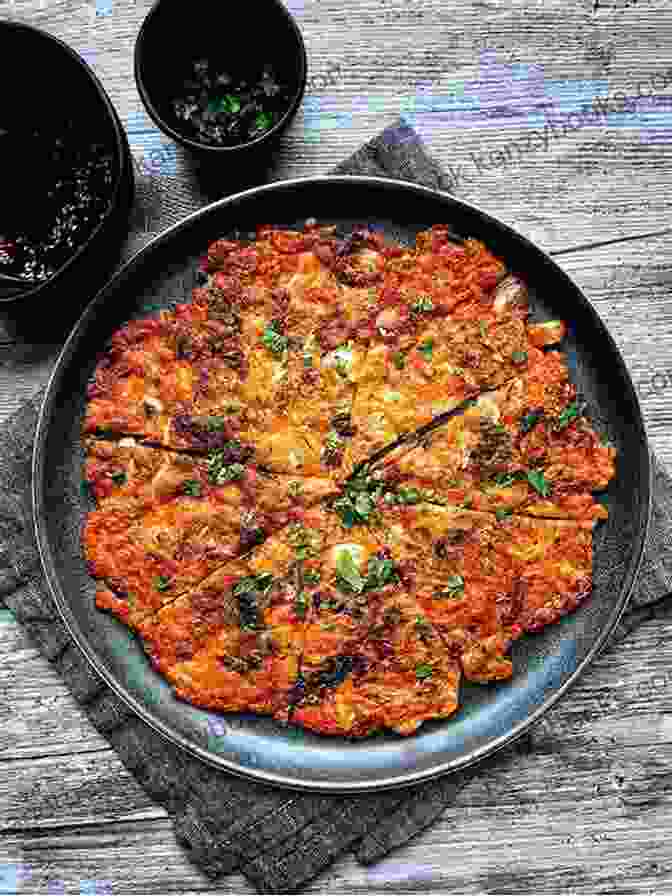 An Image Of Kimchi Pancakes, Showcasing Their Golden Brown Exterior And Crispy Texture. Cooking Korean Dishes At Home: Simple But Flavorful Korean Recipes You D Love